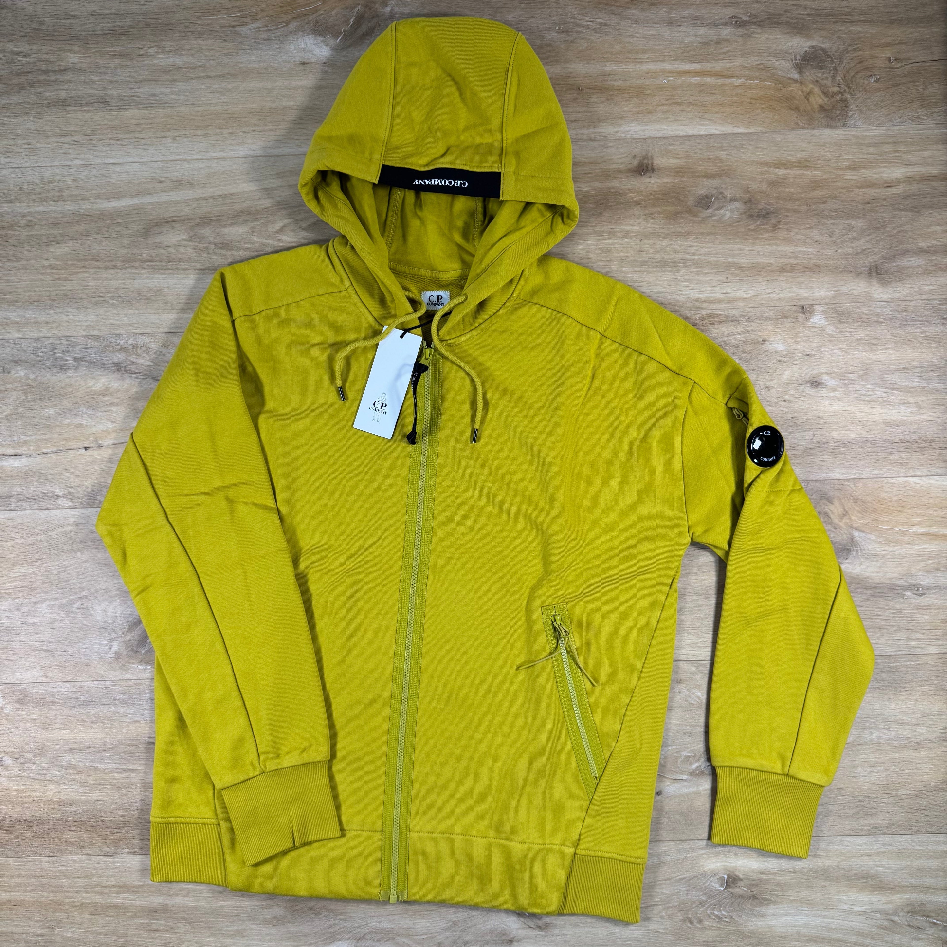 C.P. Company Diagonal Raised Zipped Lens Hoodie in Antique Moss - Yellow